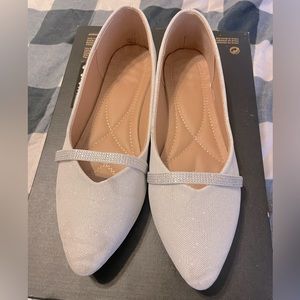 Silver and white flats